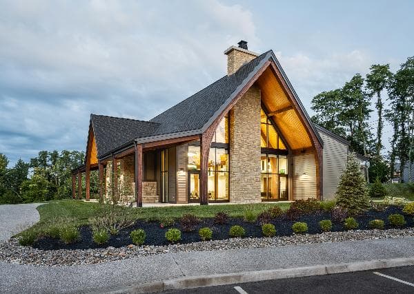 Nature park event center exterior at dusk