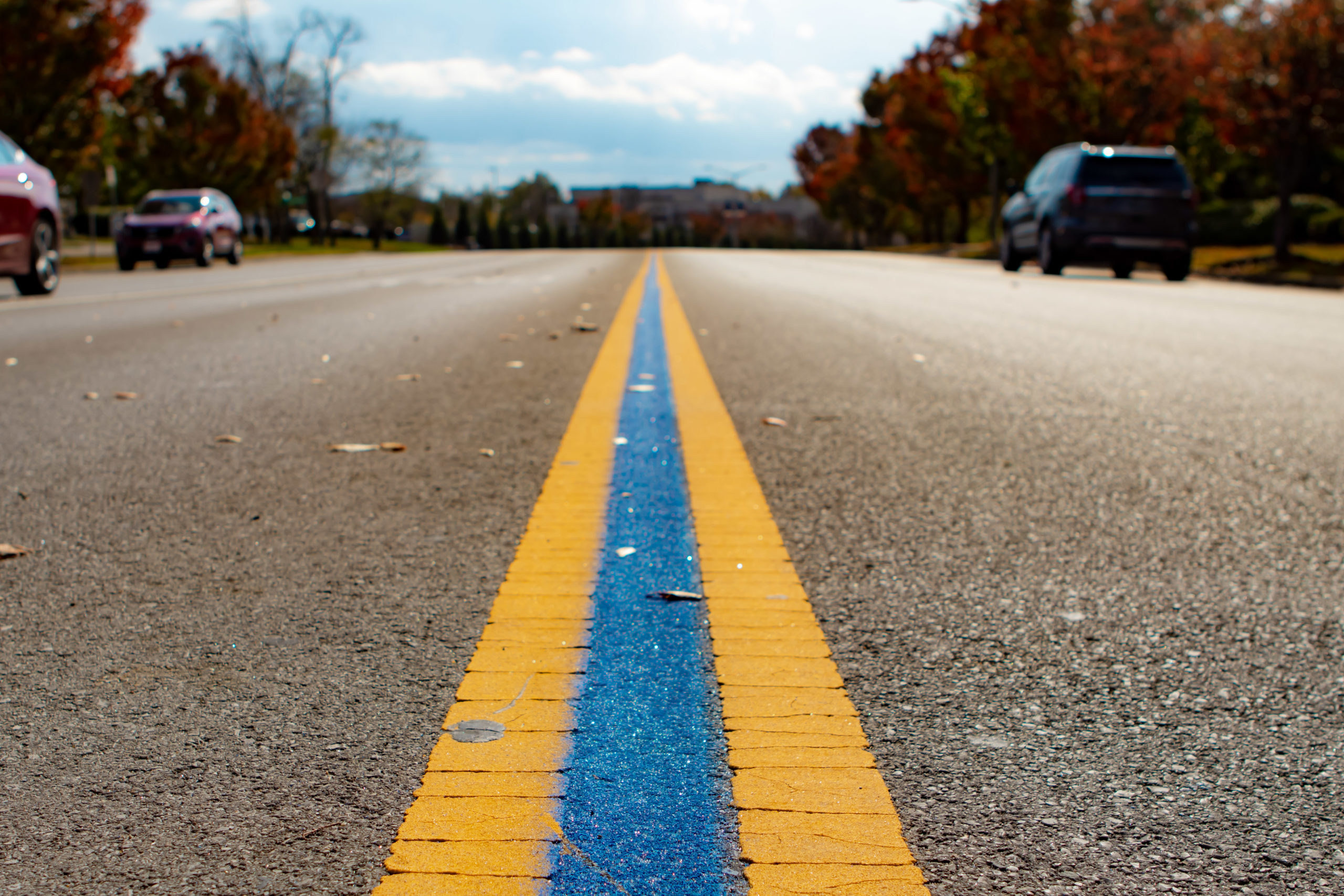 close up view of lane divider lines on a street